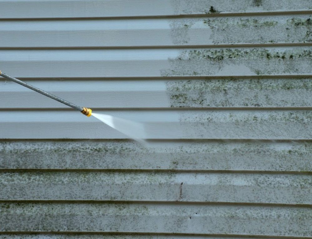 Revitalize your home's exterior with our power washing services, efficiently removing dirt and grime. Perfect for driveways, patios, and siding to enhance curb appeal and ensure a spotless finish. for CLH Services in White Marsh, MD