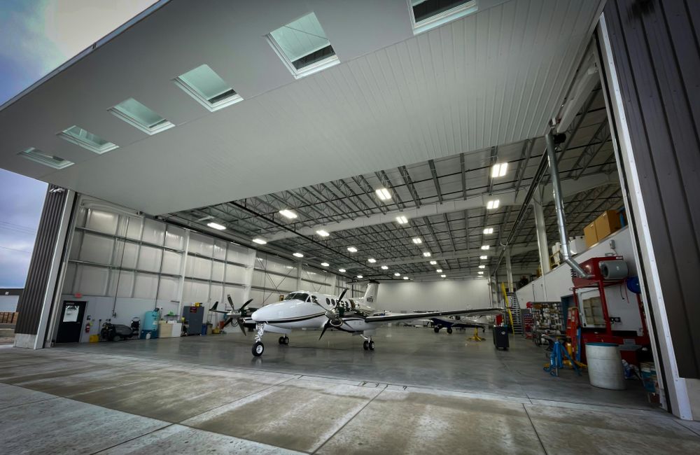 Our airplane concrete hanger pours service provides durable, high-quality concrete solutions for building secure and reliable aircraft hangers, ensuring strength and longevity to protect your investment in aviation infrastructure. for Those Guy’s Specialty Concrete in St. George, UT