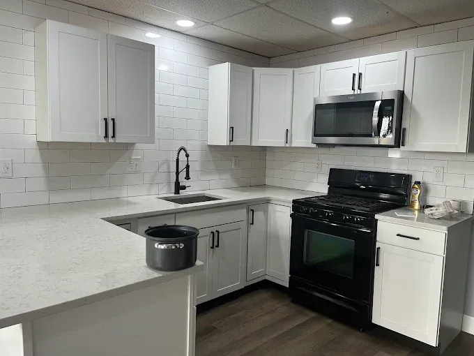 Transform your home with our expert kitchen and cabinet refinishing service. We breathe new life into outdated spaces, enhancing functionality and style while adding significant value to your property. for Smith Brothers Painting and Contracting in Franklin, NH