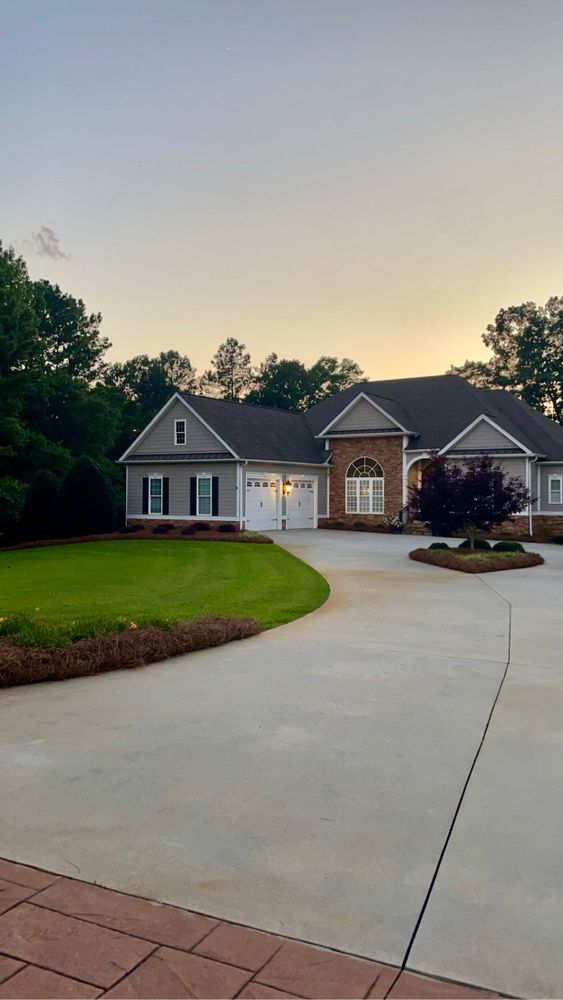 Our Landscape Enhancement services offer homeowners the opportunity to transform their outdoor spaces into beautiful and inviting landscapes through our expertise in landscaping design and maintenance. for Peach State Landscaping in Hartwell, GA