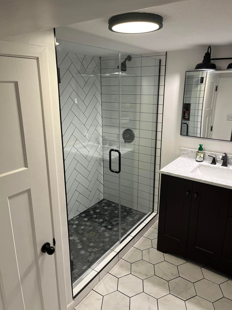 Our professional tiling service provides affordable and high-quality tile installation, repairs, and maintenance for homeowners looking to upgrade their kitchens, bathrooms, or any other tiled area in their home. for SHS Construction & Serrano's Handyman Services  in Rochester, MN