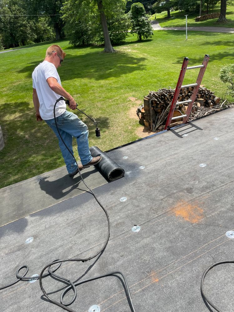 Our Modified Bitumen (torch down) flat roofing service provides durable, weather-resistant protection with expert installation, ensuring long-lasting performance and energy efficiency for your home. Trust us for reliable coverage and peace of mind. for Precious Roofing in Madeira, OH