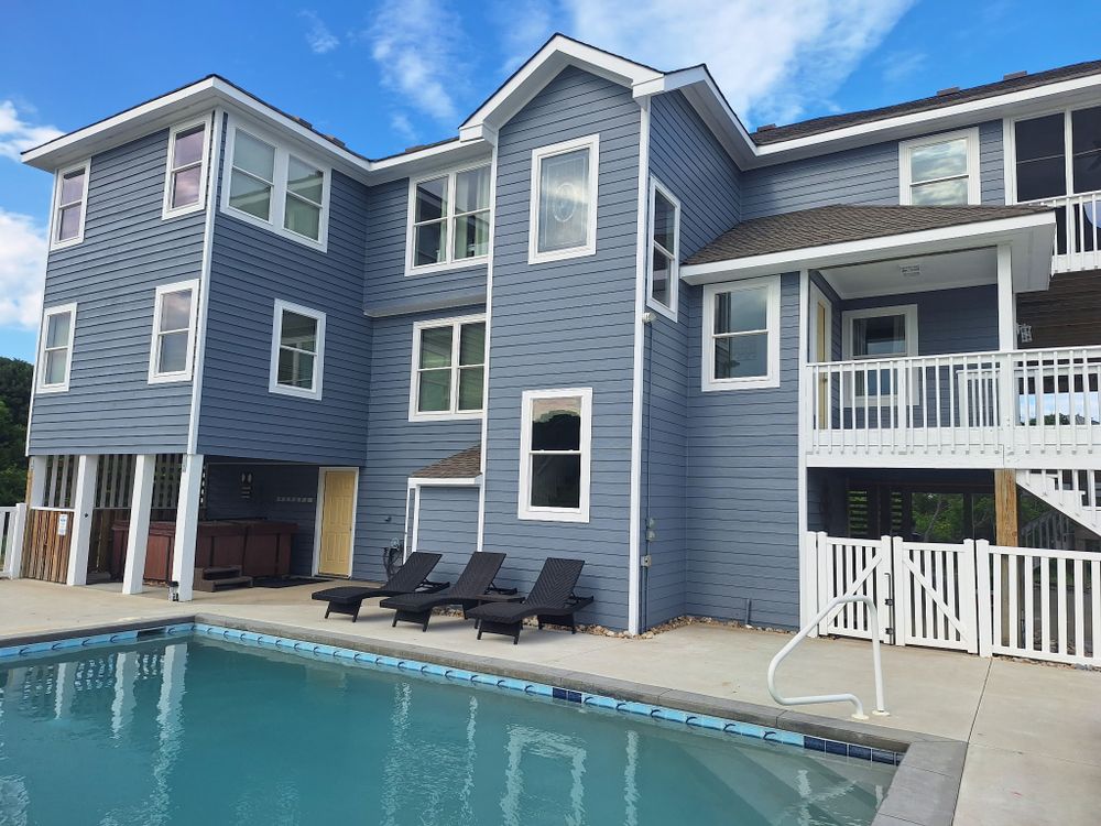 Discover our exceptional pressure washing near me service to enhance your home's exterior. We provide thorough cleaning, removing dirt and grime effectively, ensuring a pristine look for your property. for Silva Painting Company in Kitty Hawk, NC