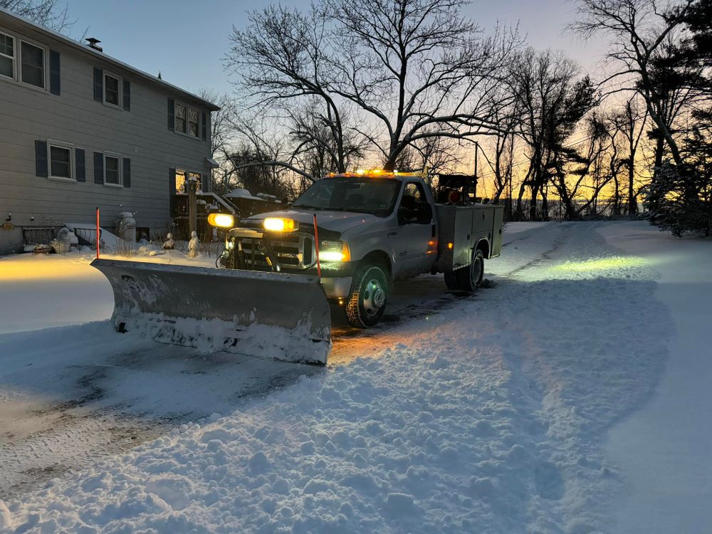 Our Fall and Spring Clean Up service includes raking leaves, removing debris, trimming bushes, and preparing your lawn for the changing seasons to maintain a beautiful landscape year-round. for Baboosic Tree & Landscape in Merrimack, NH