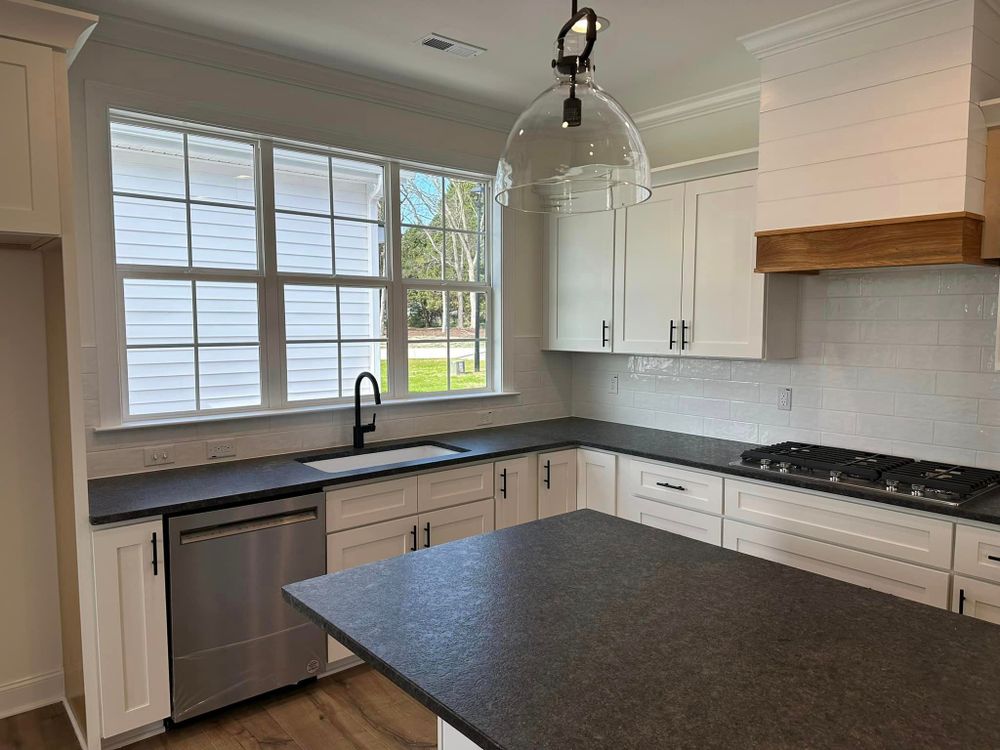 Our Kitchen & Bath Design service offers customized and functional solutions to enhance your home's aesthetic appeal and functionality, creating beautiful spaces tailored to your unique style and needs. for Prime Source Cabinetry in Clayton, NC