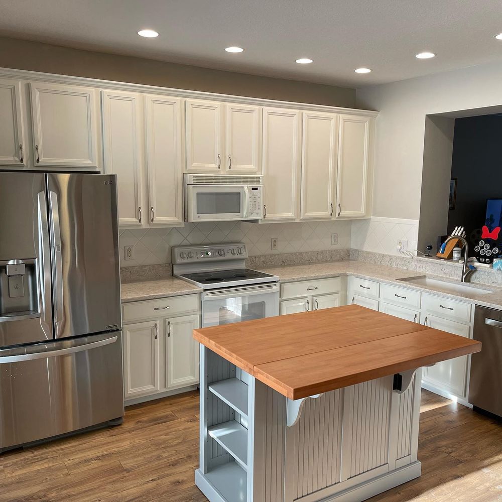 Revitalize your kitchen and cabinets with our refinishing service, bringing new life to your space through expert painting techniques that enhance durability, aesthetic appeal, and overall home value. for Noah’s Art Painting in Celebration, FL