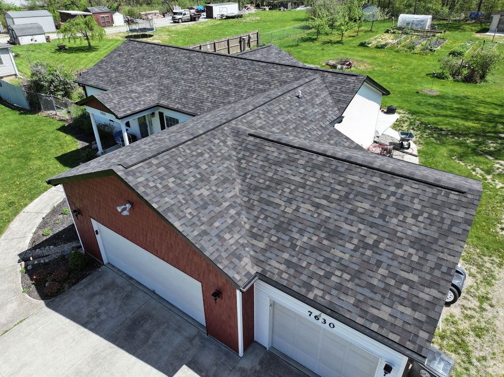 Our Roofing Installation service provides homeowners with expert craftsmanship, high-quality materials, and reliable solutions to ensure a durable and weather-resistant roof that enhances your home's safety and aesthetic appeal. for Iron Shield Roofing and Exteriors in New Haven, IN