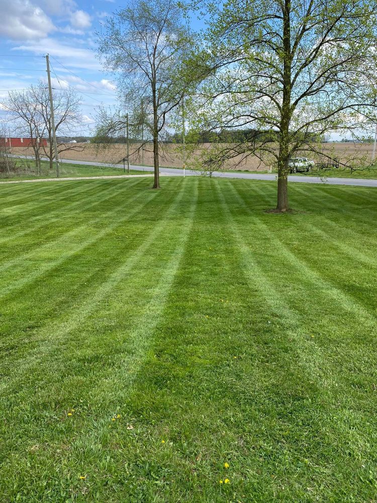 Our expert mowing service will keep your yard looking pristine all season long. Let us handle the hassle of lawn maintenance so you can enjoy a beautiful and well-kept outdoor space. for OT Lawn and Landscaping LLC in Carey, OH