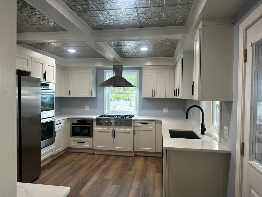 Enhance your home's elegance and durability with our expert vinyl flooring and carpet installation, ensuring a seamless finish that withstands everyday wear while adding style and comfort to any room. for Smith Brothers Painting and Contracting in Franklin, NH