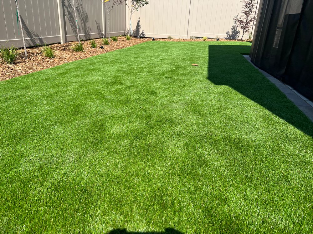 Transform your outdoor space with our Residential Artificial Turf Installation service, offering low-maintenance, eco-friendly solutions that enhance curb appeal while providing a lush, green lawn year-round. for Red Agave Landscape Build & Design in Houston, TX