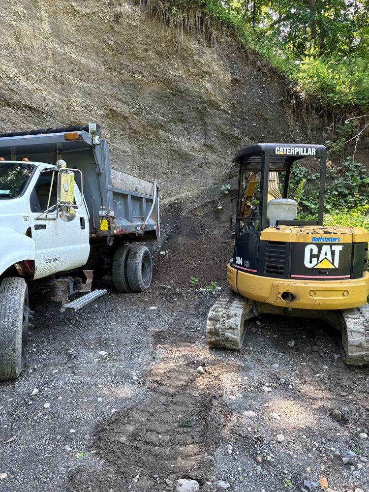 Discover the excavation meaning with our expert services, transforming your landscape by precisely preparing your property for construction or landscaping projects, ensuring a solid foundation and seamless integration into any design. for Katinas Property Maintenance in Clifton Park, NY