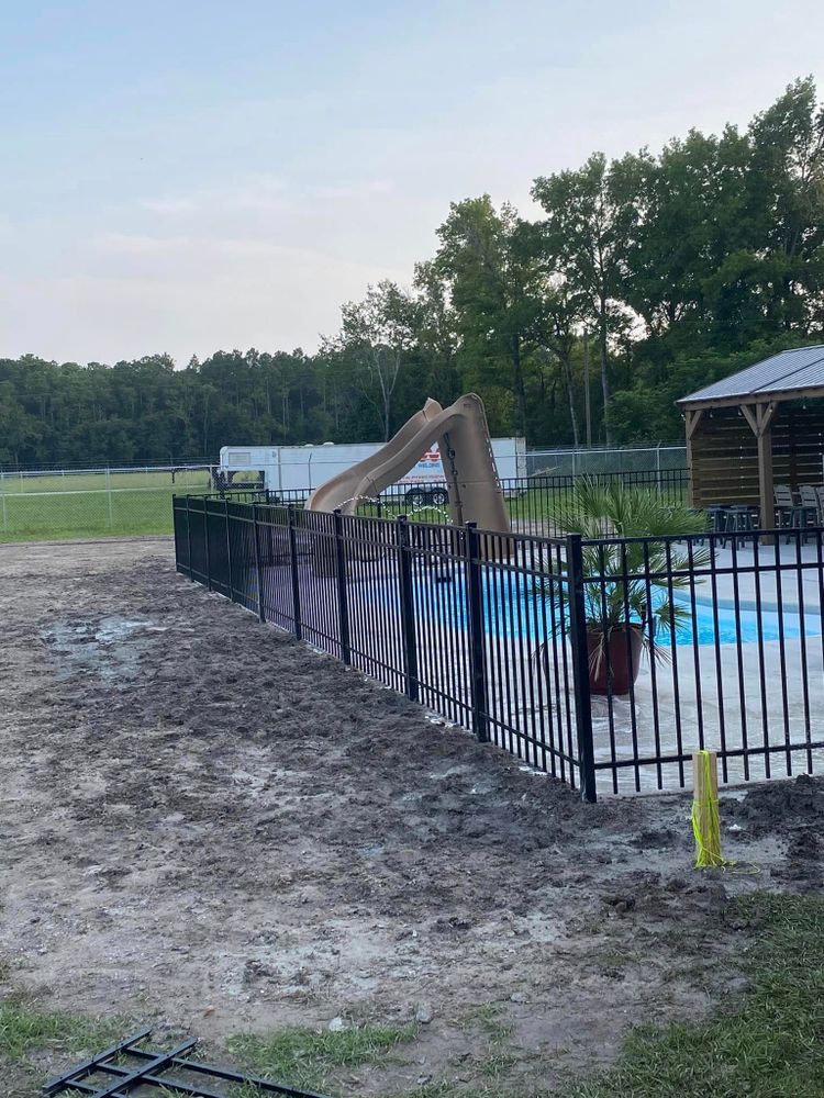 Enhance your home's security and curb appeal with our elegant Black Aluminum Fencing, offering durability, minimal maintenance, and a sleek design that complements any property aesthetic beautifully. for KDR Fence in Lancaster, SC