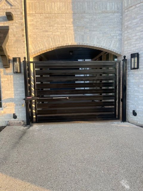 Our Gate Installation service ensures homeowners can securely control access to their property, enhancing both the aesthetic appeal and safety of their fencing system. for Fence Connection TX LLC in McKinney, TX