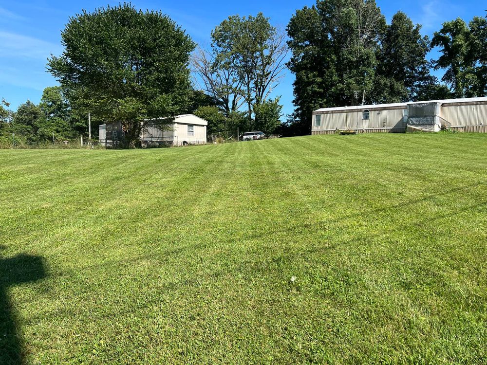 Our Hauling Services provide efficient and reliable waste removal, decluttering your property quickly. We handle everything from garden debris to old appliances, ensuring a clean and tidy space for homeowners. for The Yard Barbers in Somerset, KY