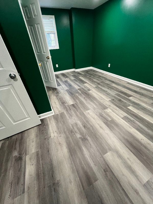Transform your home with our expert flooring services. We offer a wide range of materials and styles, ensuring durable and beautiful results tailored to fit your unique design preferences and budget. for WCDI - We Can Do it Design & Build in Sharpsburg, GA