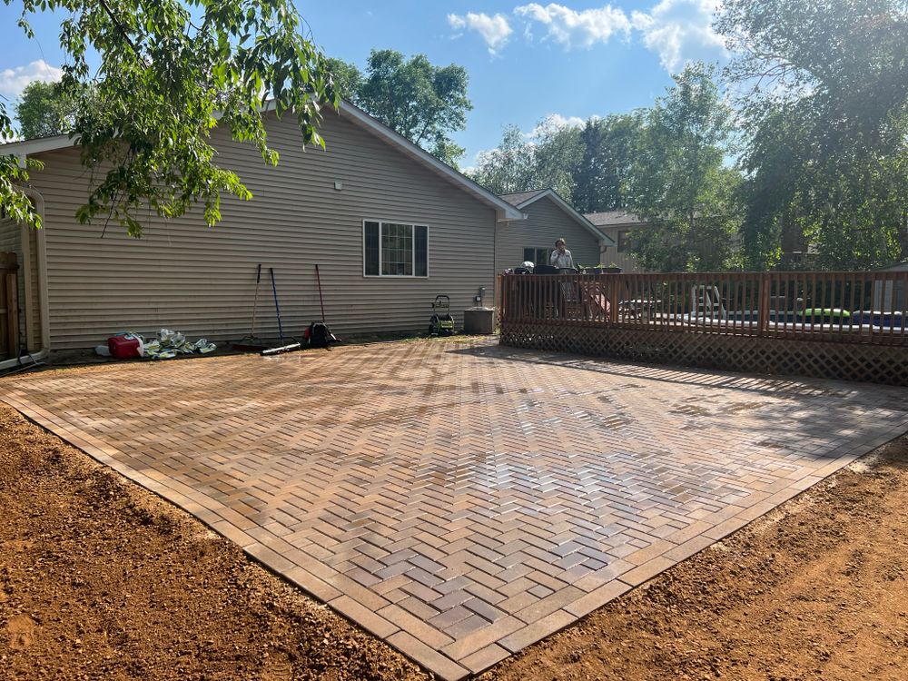 Revamp your outdoor living space with our expert Patio Design & Construction service. Elevate your home's aesthetics and functionality while enjoying high-quality craftsmanship and personalized designs tailored to your preferences. for Pro-Care LLC in Hudson, WI