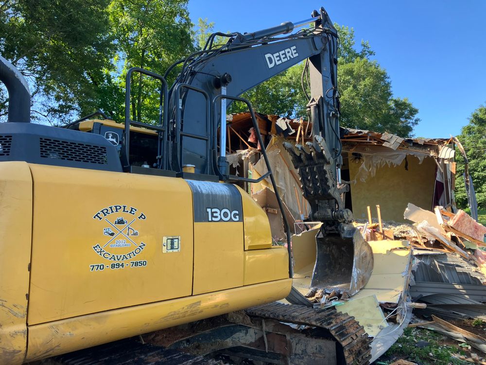 Our Demolition service efficiently and safely removes unwanted structures from your property, creating a blank canvas for new construction or landscaping projects. Trust our expertise to handle your demolition needs. for Triple P Excavation in Atlanta, GA