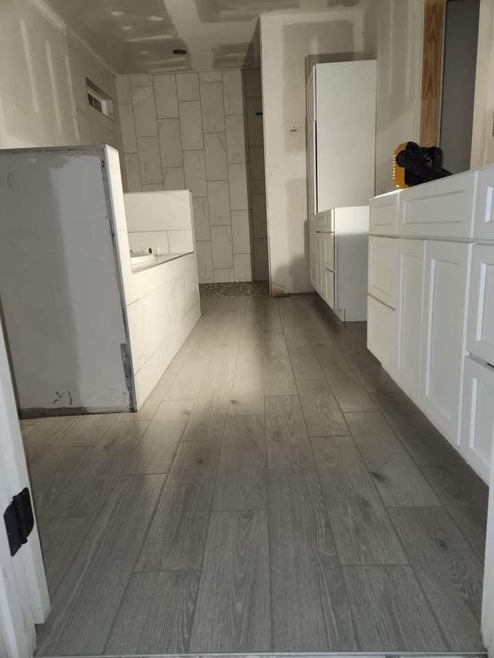 Our Floor Tiling Services deliver durable, stylish, precisely installed tiles that enhance your home’s beauty and value. We ensure expert preparation, flawless finishes, and long-lasting results tailored to every room. for Novo Tile Co. in Lillington, NC
