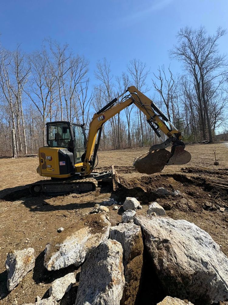 Discover the excavation meaning with our Residential Excavation service, expertly clearing and preparing your land to create a solid, safe foundation for stunning landscaping and hardscaping projects. for Chapman's Lawn & Landscape in Ellington, CT