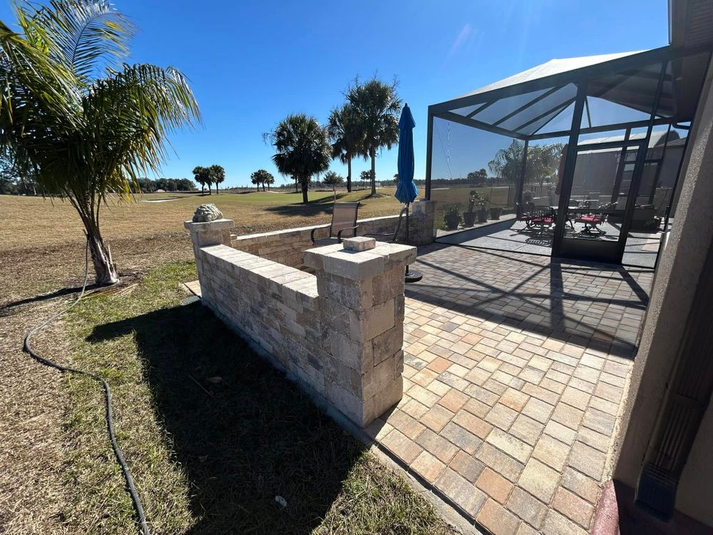 Enhance your home's curb appeal with our expert stone veneer installation service, providing durable and visually stunning stone walls that seamlessly integrate into any landscape design, tailored to suit your style and needs. for J and E LAWN Landscaping in Gainesville, Florida