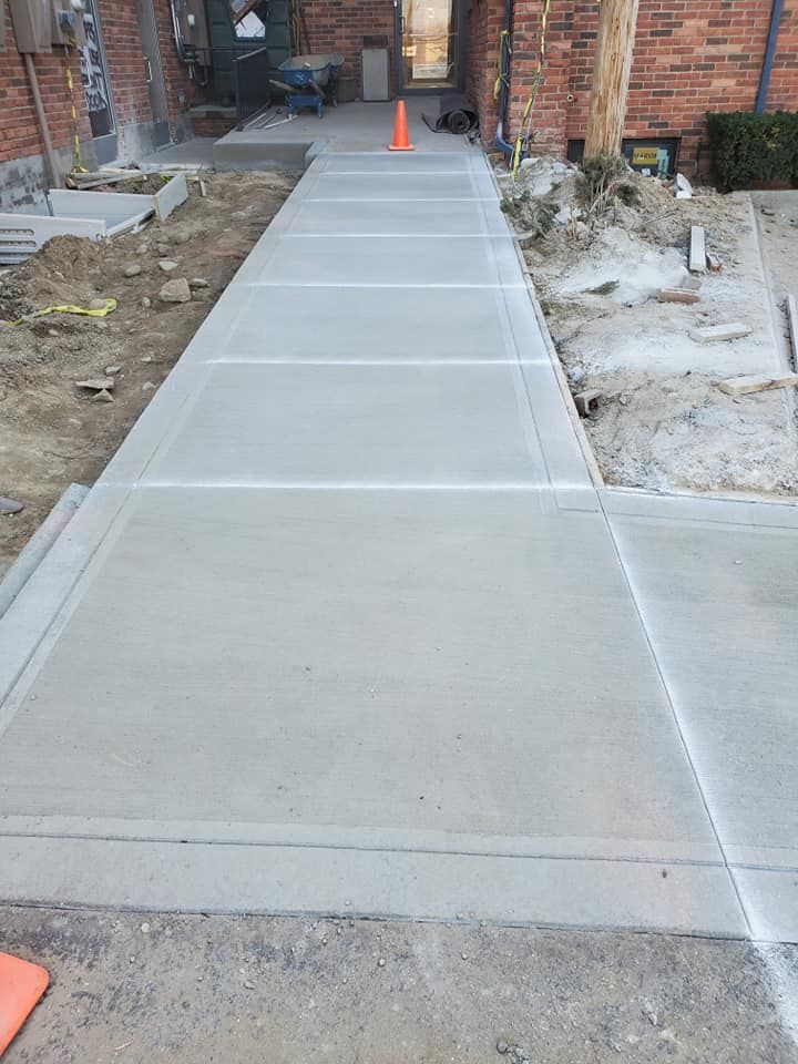 Transform your outdoor space with our Sidewalk Installation service. Our expert team will install durable and visually appealing sidewalks, enhancing the beauty and functionality of your home's exterior. for JR Concrete Placement in Macomb County,  MI