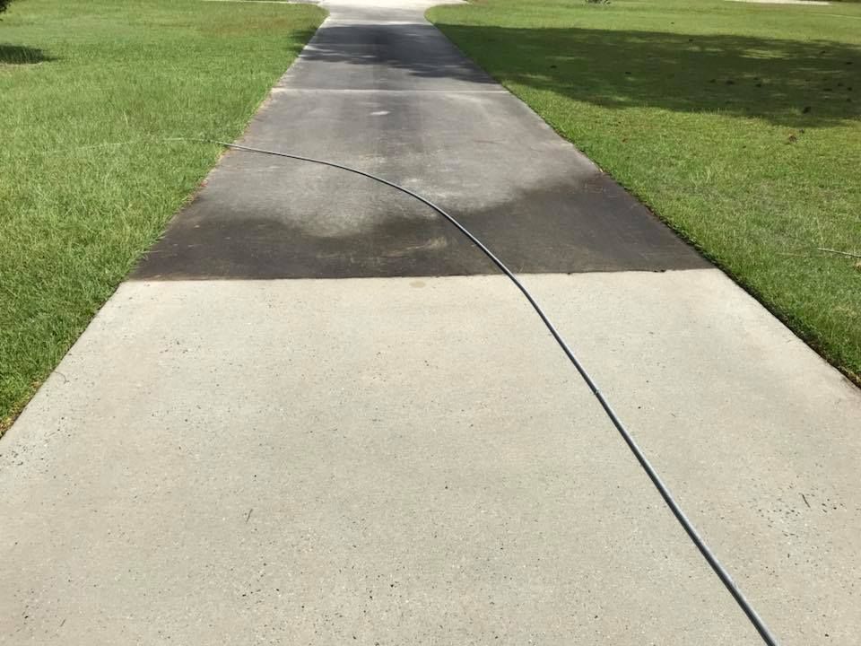 Our Driveway and Sidewalk Cleaning service efficiently removes tough stains, dirt, and grime from your outdoor surfaces using high-pressure washing techniques for a sparkling clean entrance to your home. for RB Pressure Washing in Macon, GA