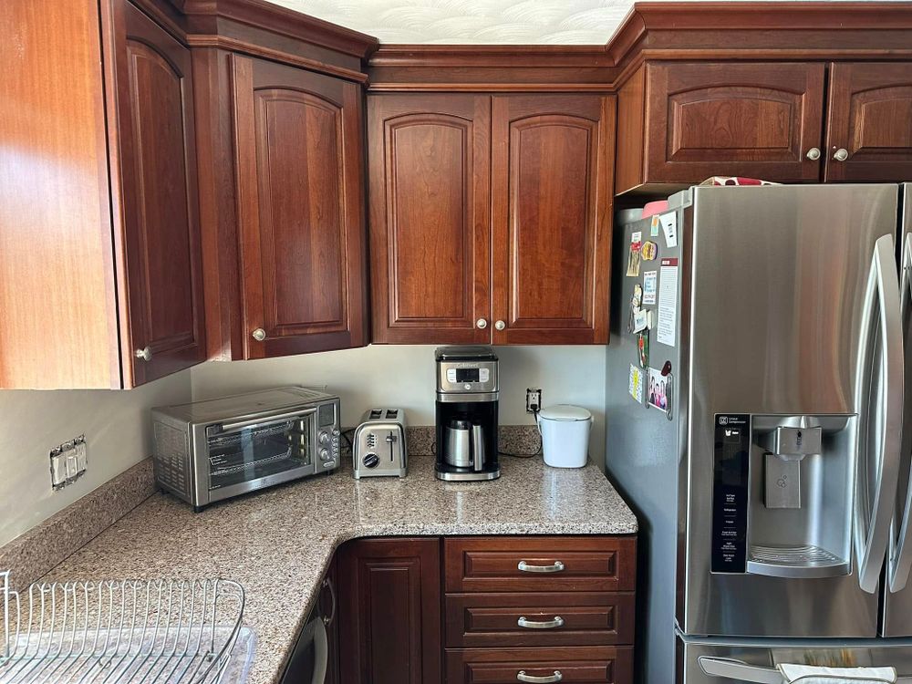 Transform your kitchen with our expert cabinet refinishing service, offering a cost-effective way to revitalize and update your space with high-quality finishes that enhance both appearance and durability. for Pure Painting in Holland, MA