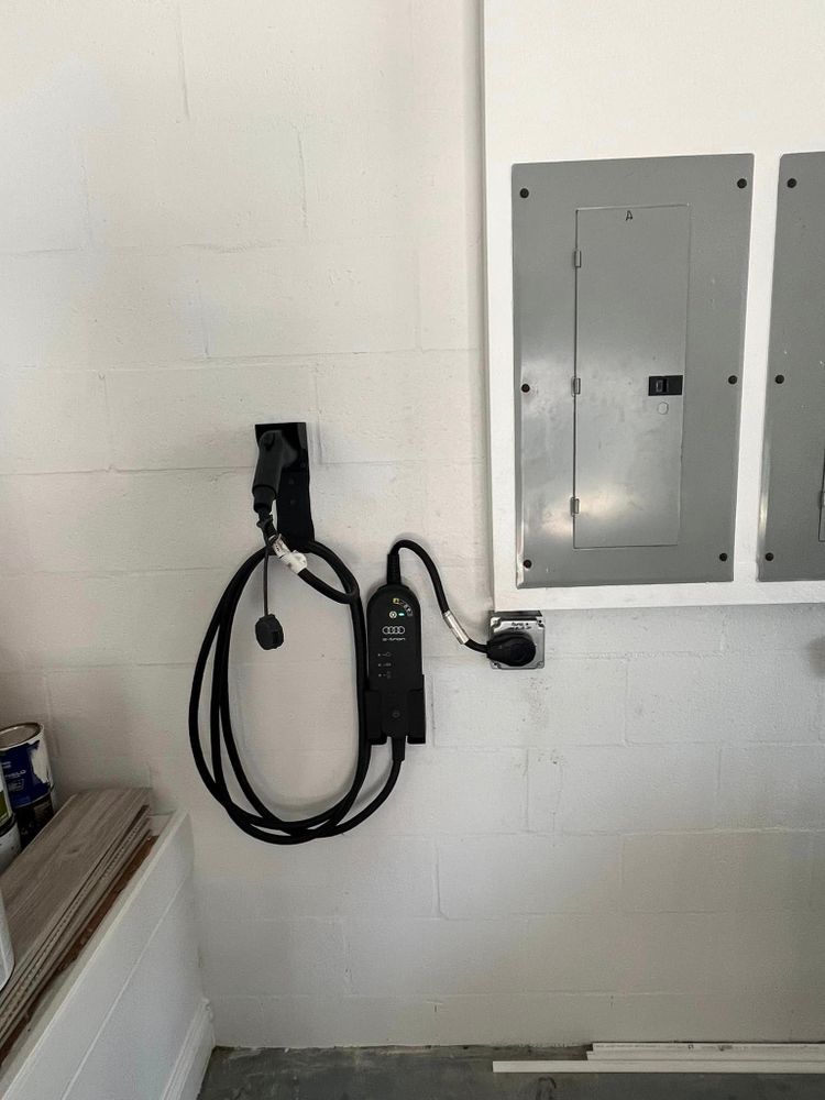 Our Electric Car Chargers service ensures seamless installation and safe operation, performed by experts in electrical repairs, enhancing your home's efficiency while supporting sustainable transportation solutions for eco-conscious homeowners. for Manny’s 407 Eléctric Inc in St. Cloud, FL