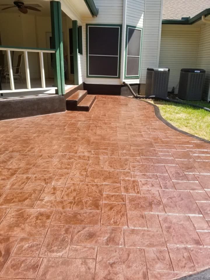 Transform your outdoor space into a beautiful and functional patio oasis with our expert design and installation service. Enhance the value and enjoyment of your home with custom concrete patio solutions. for Triple Crown Custom Concrete in San Antonio, TX