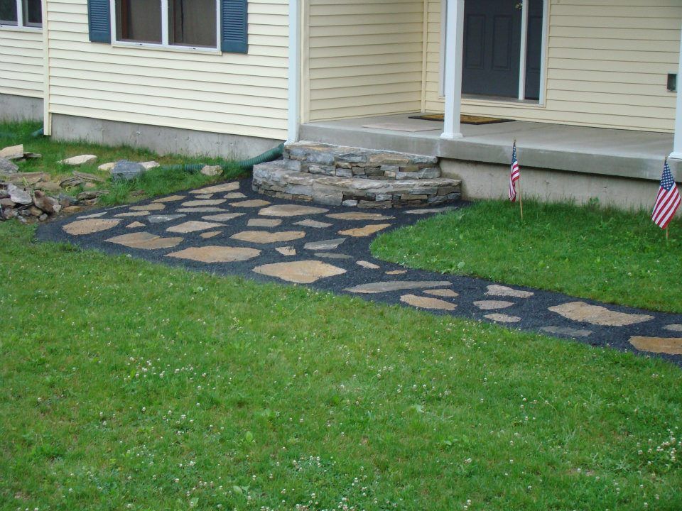 Our Hardscaping service transforms outdoor spaces with expertly crafted patios, walkways, and retaining walls, enhancing your home's aesthetic appeal and functional value while providing durable solutions for all your landscaping needs. for RedTail Construction in Woodstock, CT