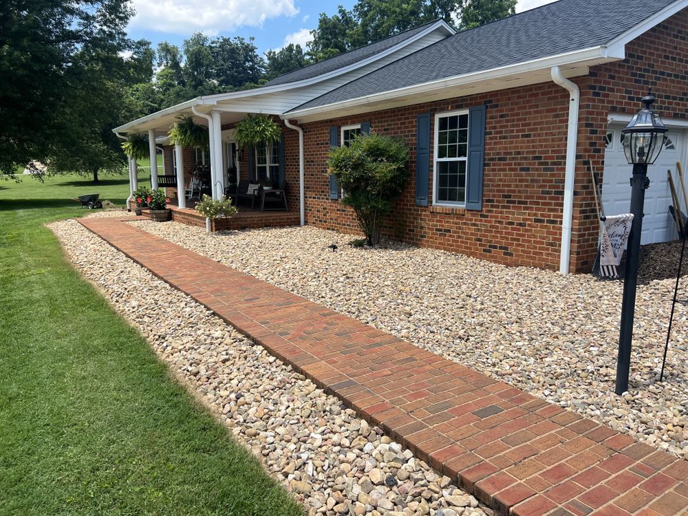 Refresh and define your landscape with our mulch bed installation and renovation service, delivering clean edges, healthy plant protection, weed suppression, improved curb appeal, and a polished look for your home. for Foremost Services in Martinsville, VA