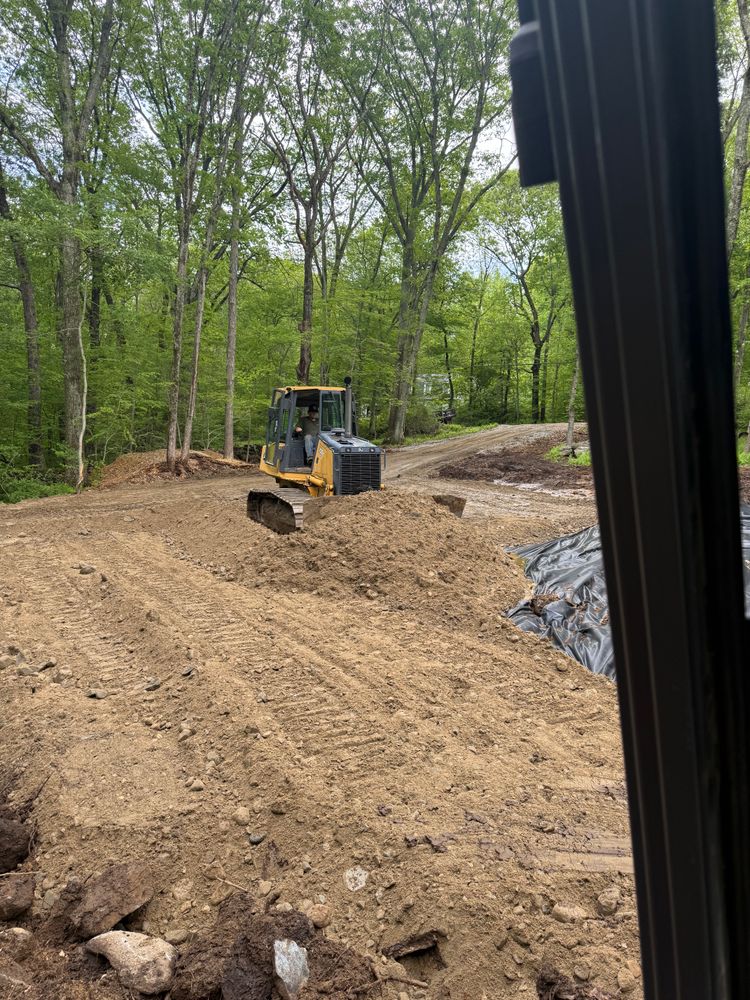 Our Land Grading service ensures a level foundation for your project, improving drainage and stability while enhancing overall landscape appearance. Trust our expertise for efficient preparation and flawless results in every terrain. for DArcy  Cleveland & Sons Excavation LLC in Pawcatuck, CT