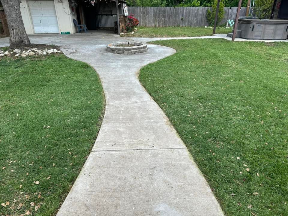 Enhance your home's curb appeal with our professional edging services, creating clean, defined lines between grass and pathways to give your lawn a polished and well-maintained appearance all year round. for Watson Lawn Care in Hillsboro, TX