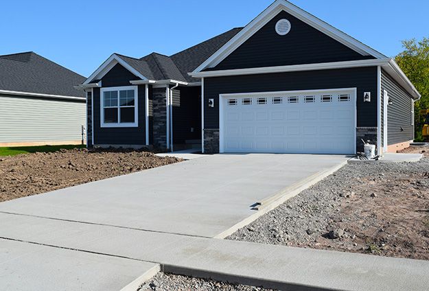 Enhance your home's curb appeal with our expert concrete services, offering durable pathways and stylish patios. Trust our skilled professionals to deliver top-quality results tailored to complement your landscape design seamlessly. for Broadway & McMullen Construction in Purvis, MS