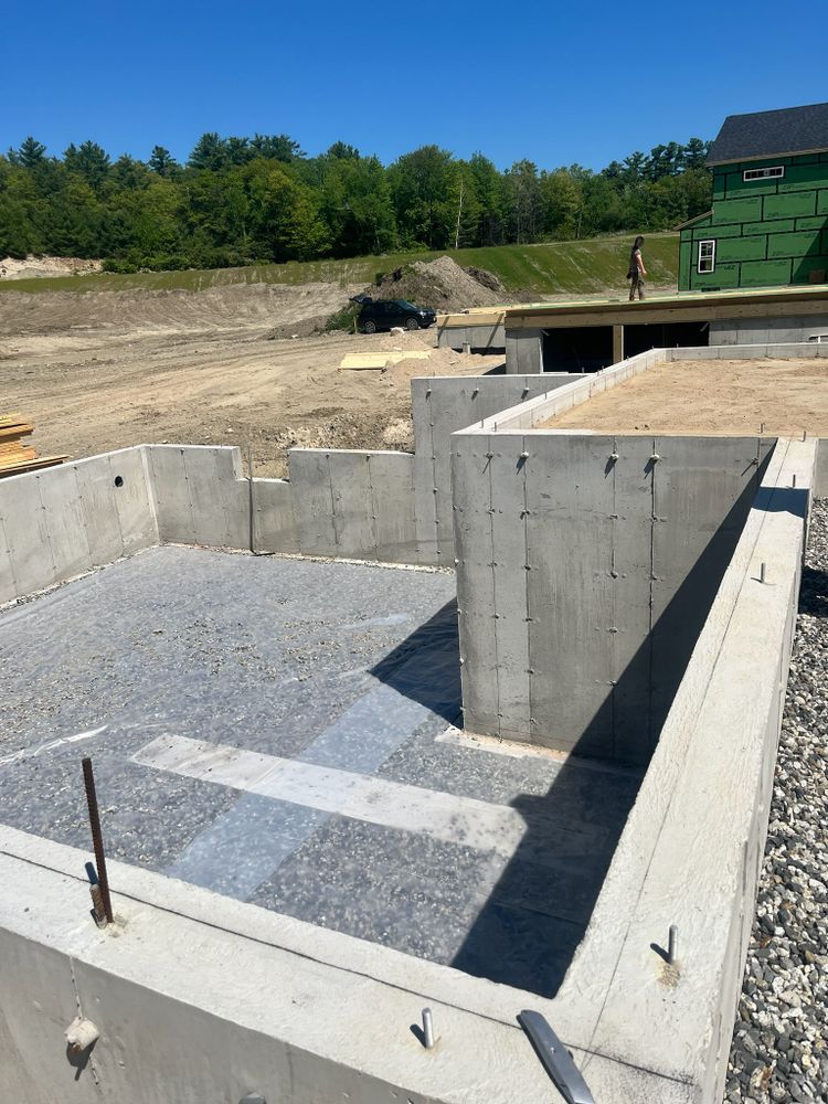 Our Foundation Walls service ensures the foundations of your home are strong and durable, offering expert solutions for new constructions or repairs to enhance structural integrity and longevity. for Custom Concrete of Maine in Biddeford, ME