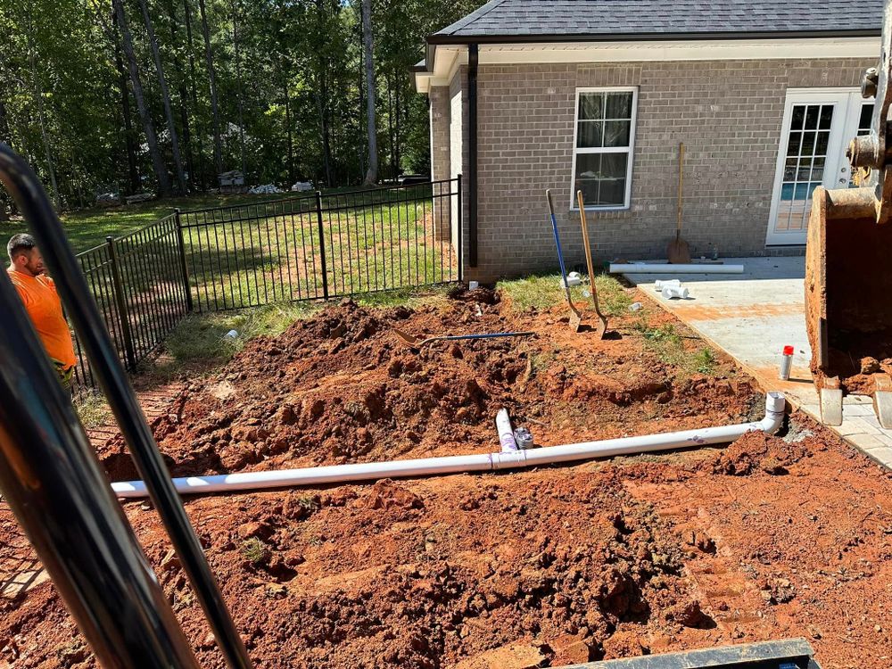 Our Electrical Conduits service ensures safe and efficient underground installation, protecting your home's electrical systems from damage while maintaining optimal energy flow through expertly excavated and secure conduit pathways. for Precision Site Works LLC in Mocksville, NC