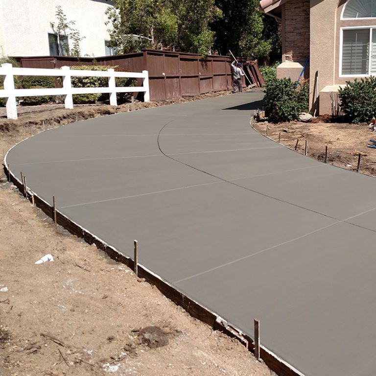 Our Concrete Installation service provides professional and reliable installation of concrete walkways, patios, driveways and more. We guarantee fast and efficient work! for Red River Landscape & Design in Sealy,  TX