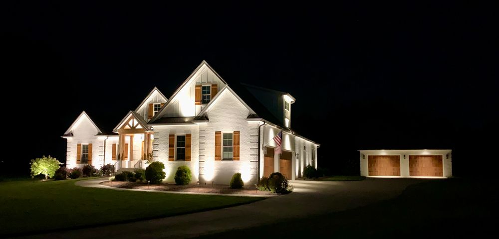 Enhance your home's beauty and security with our expert outdoor lighting design and installation. We tailor each project to illuminate key features, ensuring a stunning landscape that transforms after dark. for Malboeuf Landscaping, Inc in Kernersville, NC