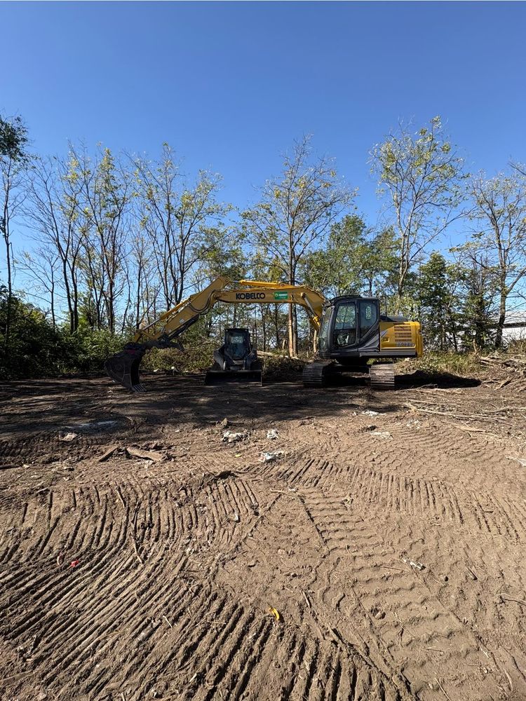 Our Land Grading service ensures your property's terrain is level and properly sloped for optimal drainage, enhancing landscape appearance while preventing erosion and foundational issues for future construction or landscaping projects. for Midwest Excavation & Landscape in Pontiac, IL