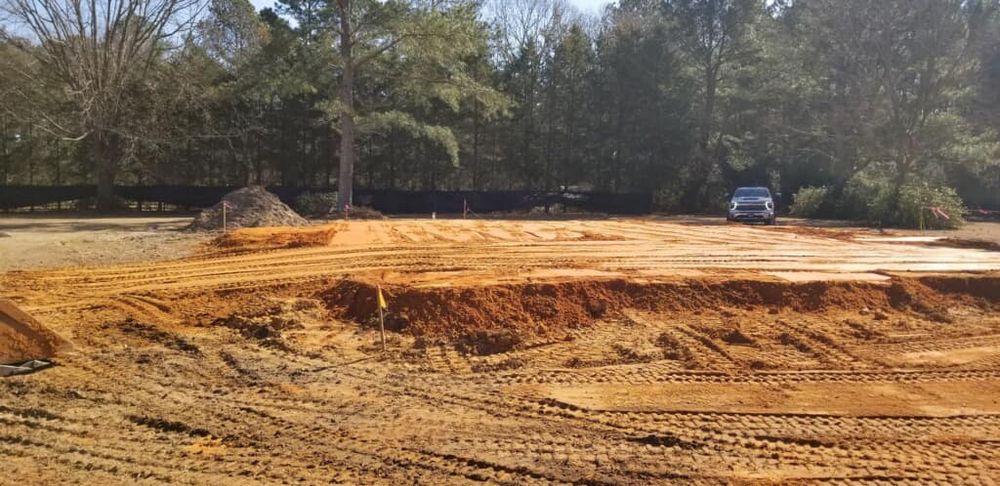 Our Site Preparation service includes aeration services to ensure healthy grass growth by improving soil compaction, allowing better water absorption, root development, leading to a lush green lawn. for SodGods Lawncare and Landscaping in Fayetteville , NC