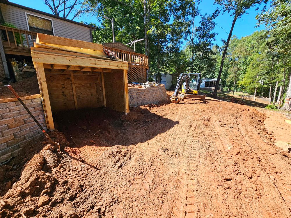 Our Land Grading service expertly levels and shapes your property, enhancing drainage, preventing erosion, and ensuring a solid foundation for landscaping or construction projects to enhance the value of your home. for O'Connor Clearing and Hauling LLC in Anderson County, SC