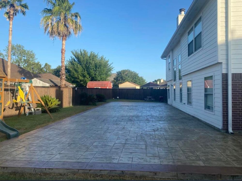 Our stamped concrete installation service transforms ordinary concrete surfaces into decorative pieces, resembling expensive materials like brick, slate or stone, providing durability and aesthetic appeal to your outdoor spaces. for Delarosa Concrete & Stamping in Pearland, TX