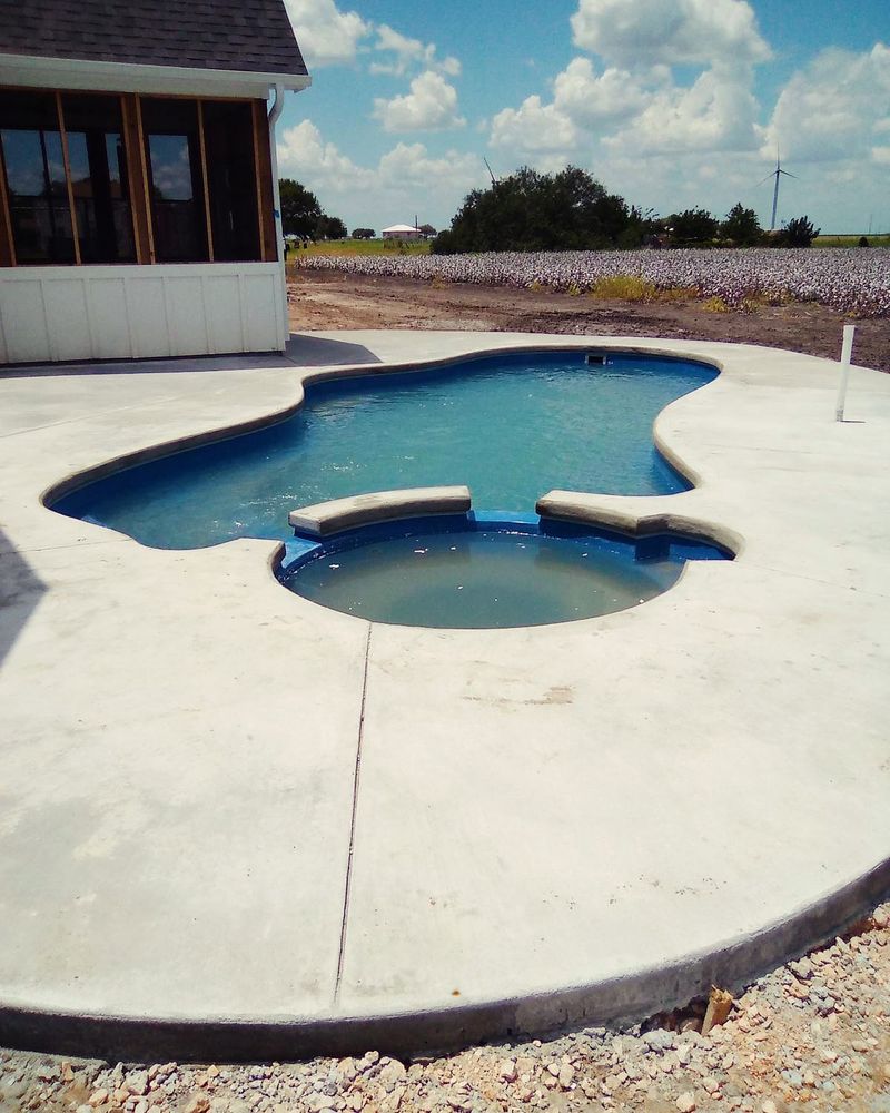 Enhance your outdoor space with our expert pool deck builds, combining durable concrete craftsmanship and stylish design to create safe, long-lasting surfaces perfect for relaxation and entertaining by the pool. for Keen Decorative Concrete in Corpus Christi, TX