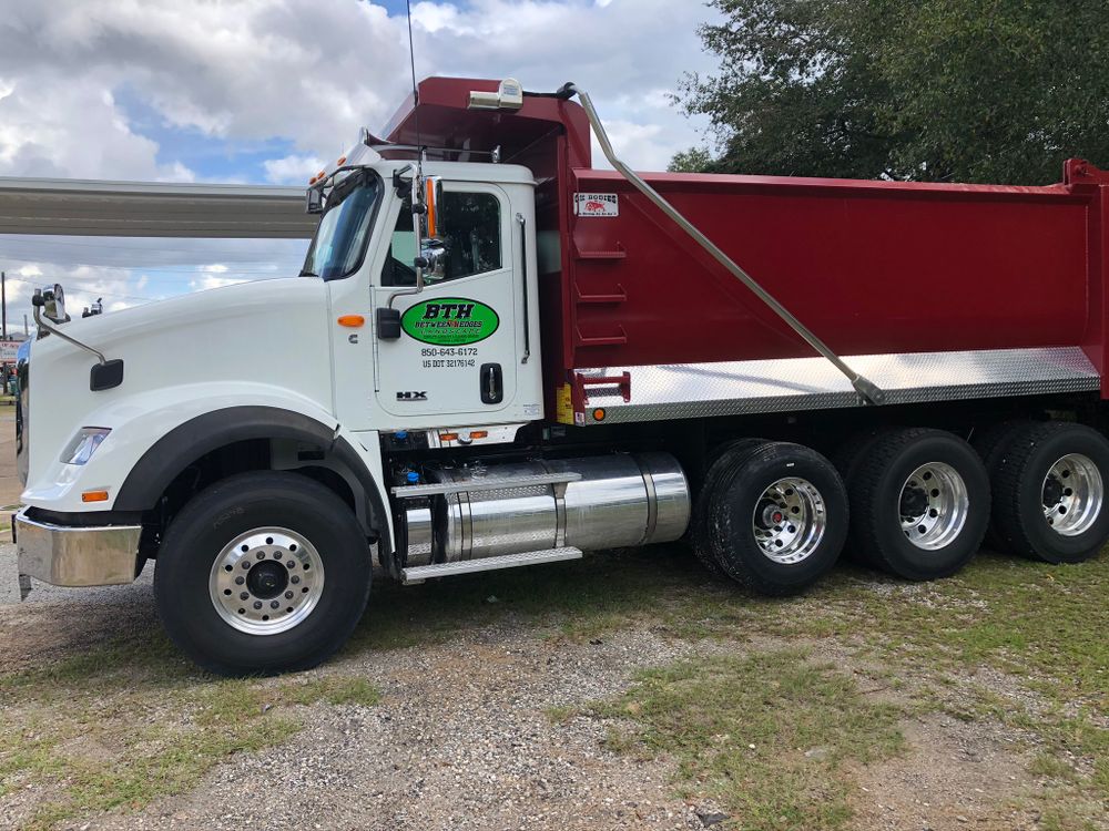 Hauling for Between The Hedges Landscape & Trucking LLC in Altha, FL