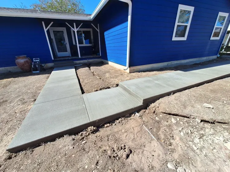 Our stair design and installation service creates durable, attractive concrete stairs tailored to your home, combining expert planning, precise forming, and quality craftsmanship for safe access and lasting curb appeal. for Leo's Concrete Crew in Elgin, TX
