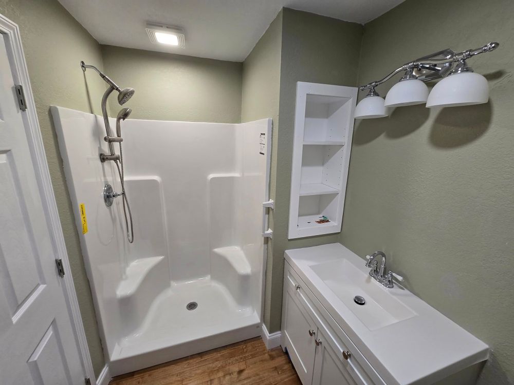 Transform your bathroom into a modern oasis with our expert renovation service, providing personalized designs, high-quality materials, and skilled craftsmanship for a seamless upgrade to maximize comfort and style. for Deck It OUT Handyman & Remodeling in Clinton, TN