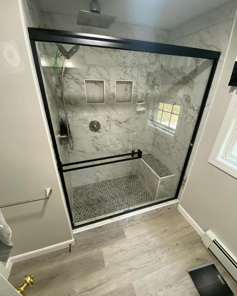 Transform your bathroom into a modern oasis with our expert renovation services, offering quality craftsmanship, customized designs, and efficient project management to enhance both style and functionality in your home space. for Clark co. Construction in Attleboro, MA