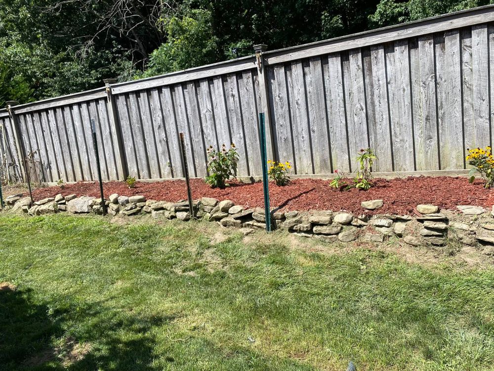 Enhance your garden's health and appearance with our professional mulching service. We protect soil, retain moisture, and suppress weeds, ensuring a vibrant landscape that thrives in every season. for Lopez Landscaping & Snow Removal LLC in Conneaut, OH