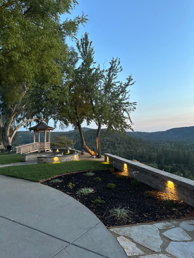 Illuminate your outdoor space and enhance your home's beauty with our Landscape Lighting service. We provide expert installation, ensuring a stunning and secure lighting solution for your yard at night. for Diamond Landscape & Hardscape in Diamond Springs, CA