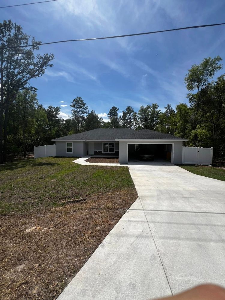 Enhance your home's curb appeal with our Driveway Design & Build service, offering expert craftsmanship and personalized solutions to create functional, durable driveways that beautifully complement your garden fencing style. for Browne’s Yard Creations in Fruitland Park, FL